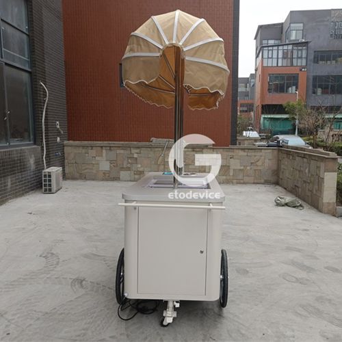 portable dessert cart outside London shop